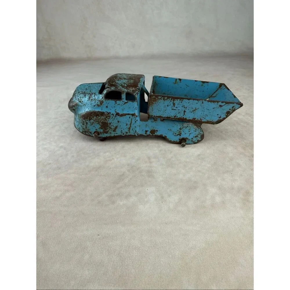 Vintage 6in Blue Wyandotte Pressed Steel Dump Truck Toy READ